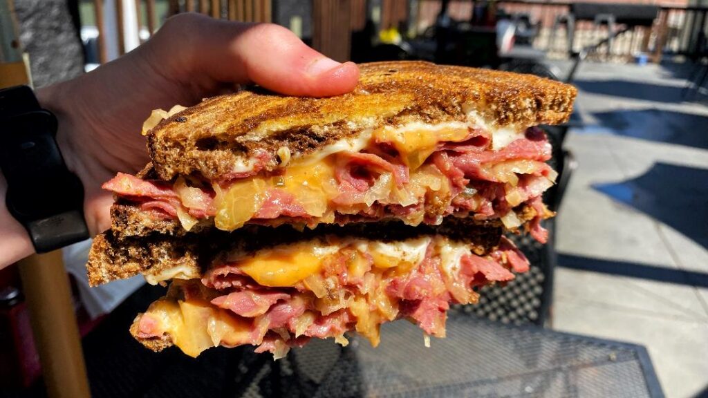 Barrett's Barleycorn Pub & Grill Reuben (in hand)