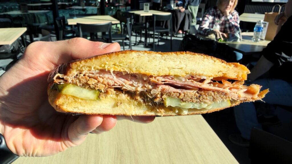 J. Gorat's Deli + Market Cuban Press (in hand)