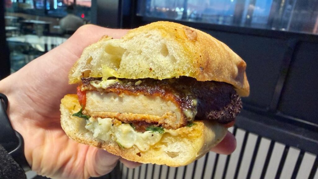 J.Gorat's Chicken Cutlet Sandwich (in hand)