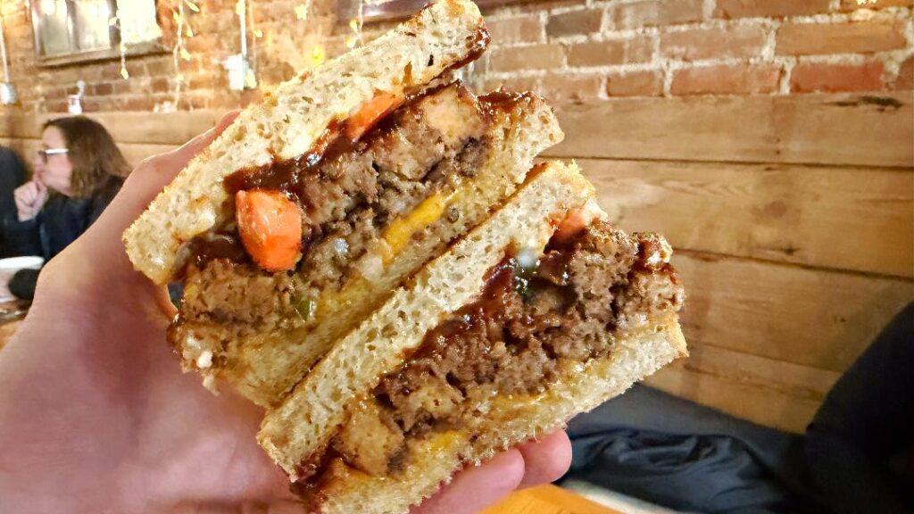 Kitchen Table Meatloaf Sandwich (in hand)