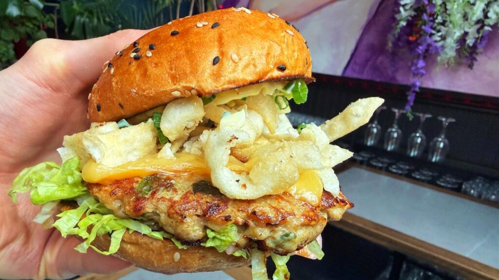 Cattle Call Momo Burger (in hand)