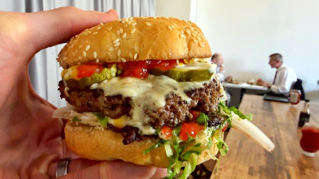 Block 16 Block Burger (in hand)