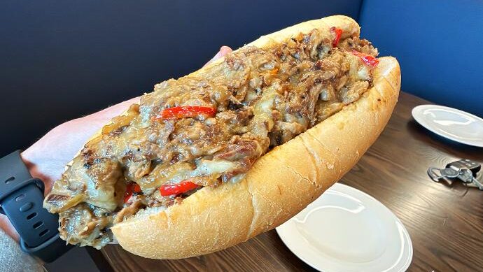 Approach at Indian Creek Black Bird Cheesesteak (in hand)